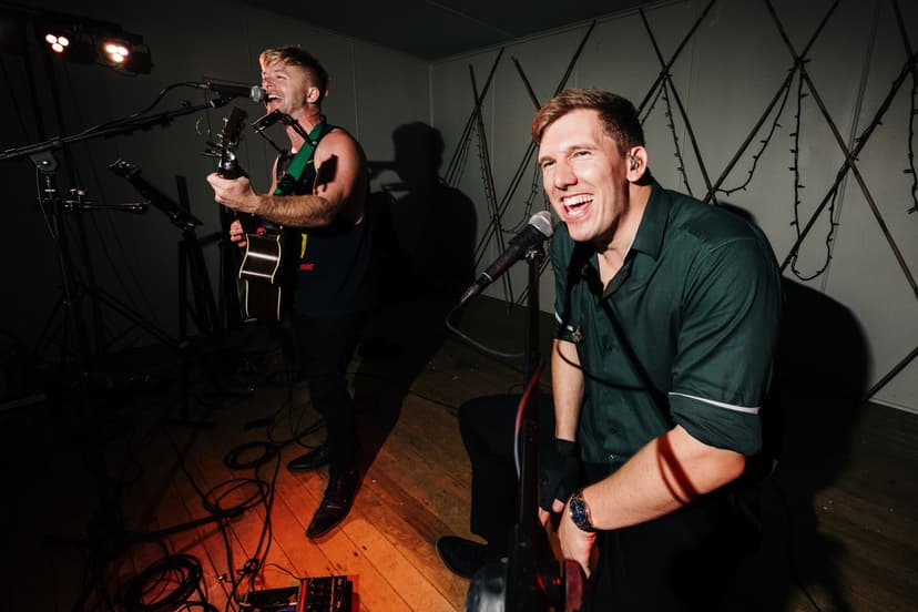 Indoor tent performance in green shirts